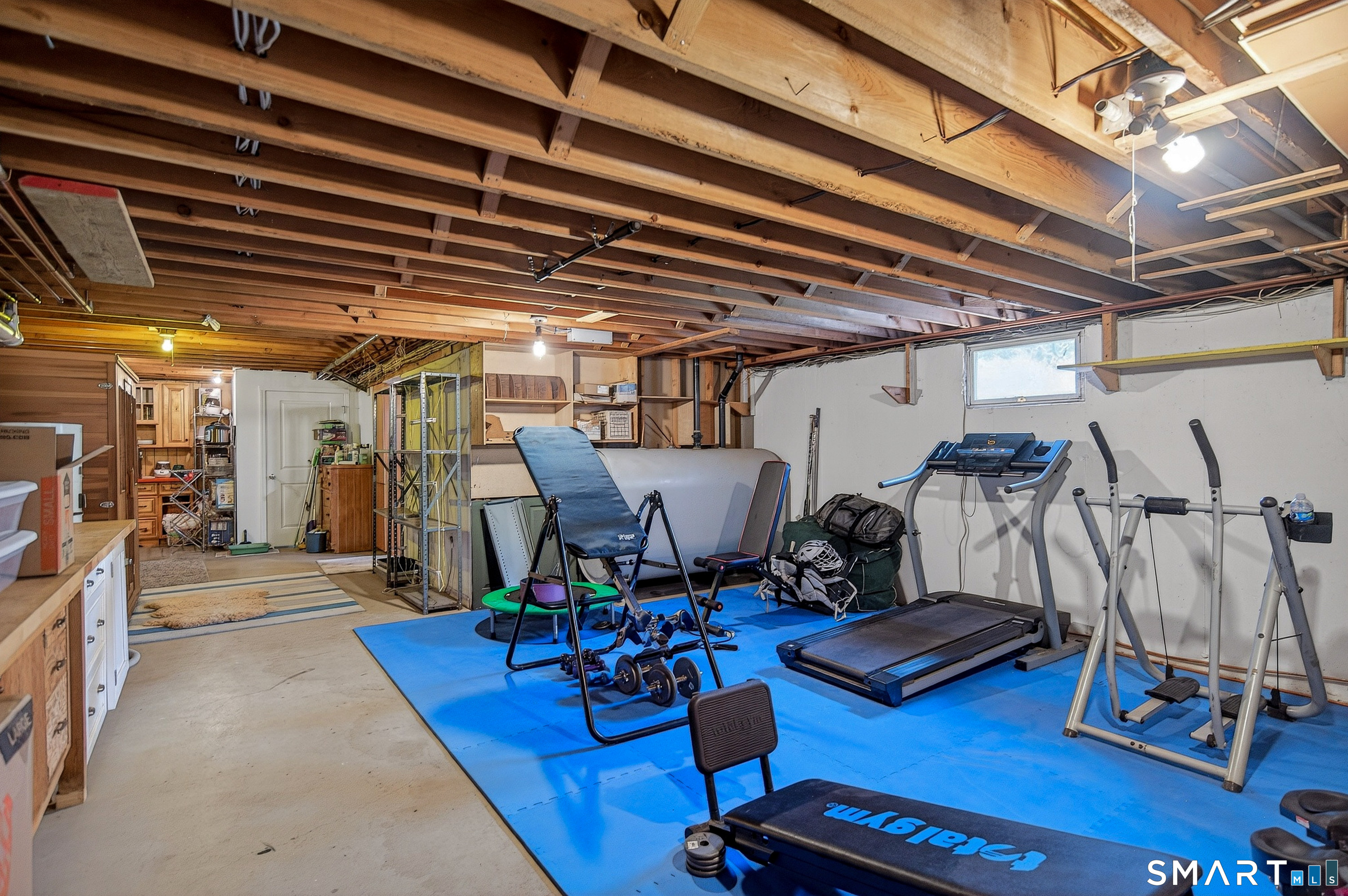 174 Huntingtown Road Newtown, CT 06470 - Photo 30 of 40 a view of a room with gym equipment