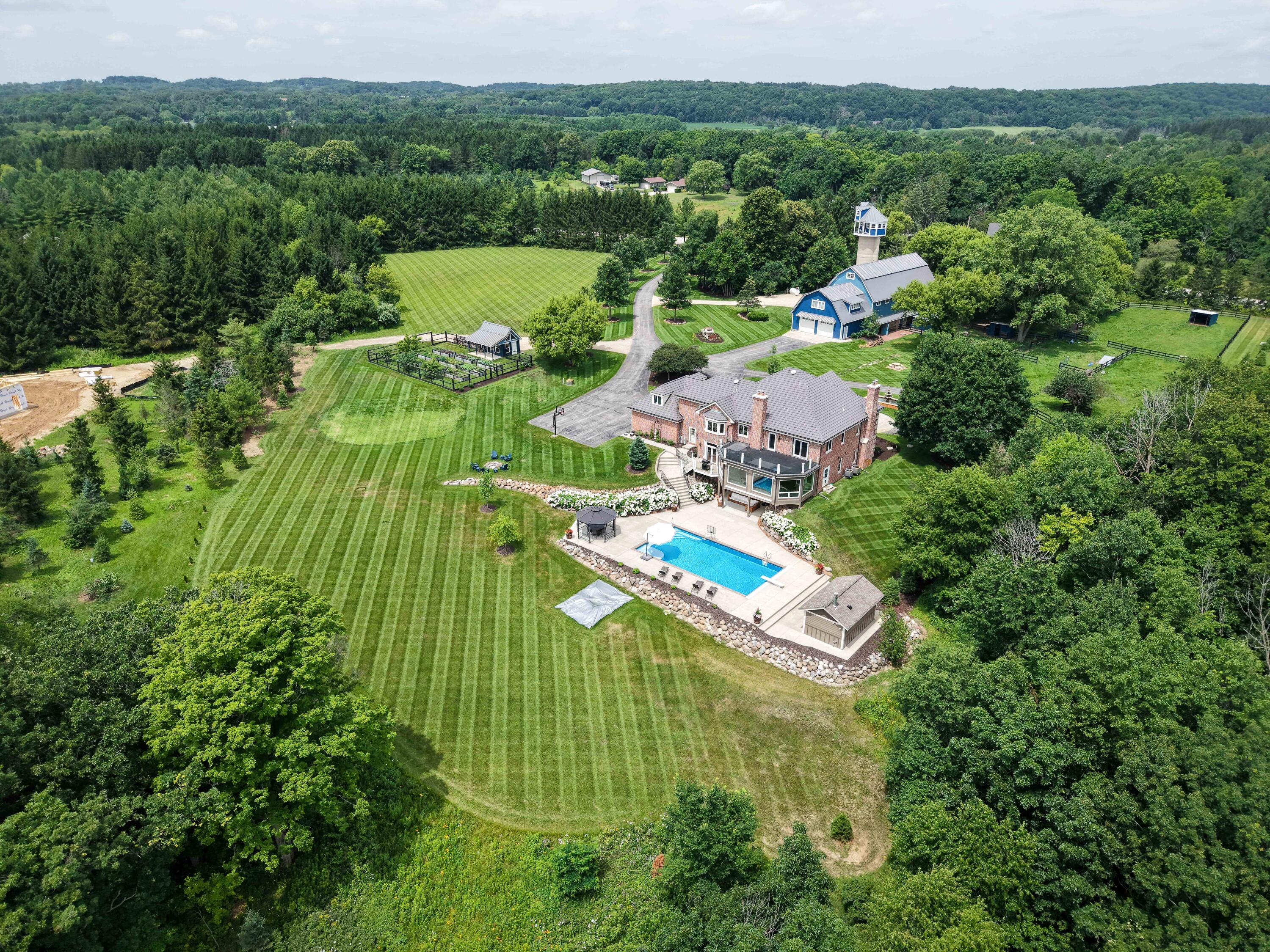 3855 County Highway Slinger, WI 53086 - Photo 59 of 144 DJI_20250710121647_0045_D