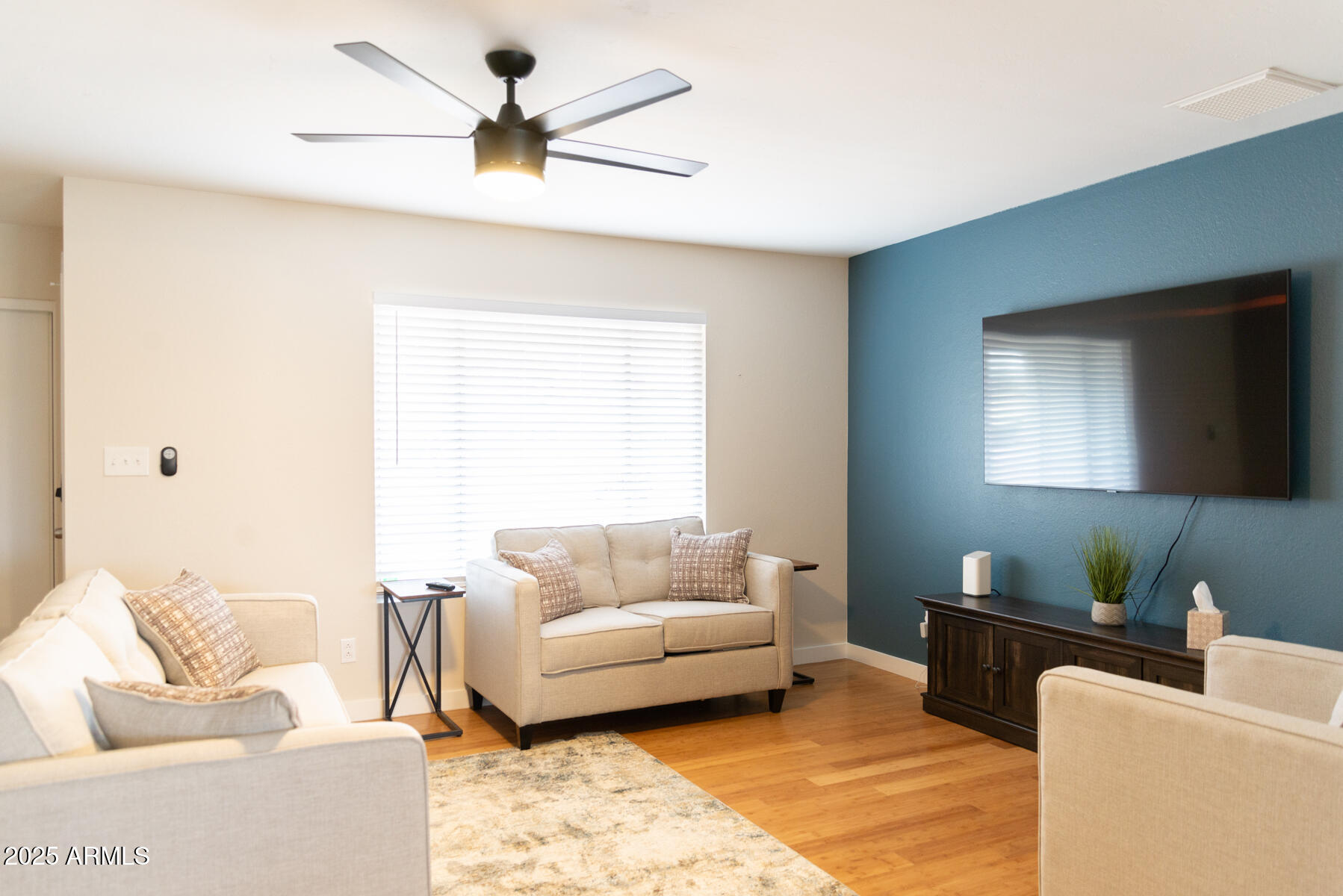 2140 East Broadmor Drive Tempe, AZ 85282 - Photo 14 of 26 a living room with furniture and a window