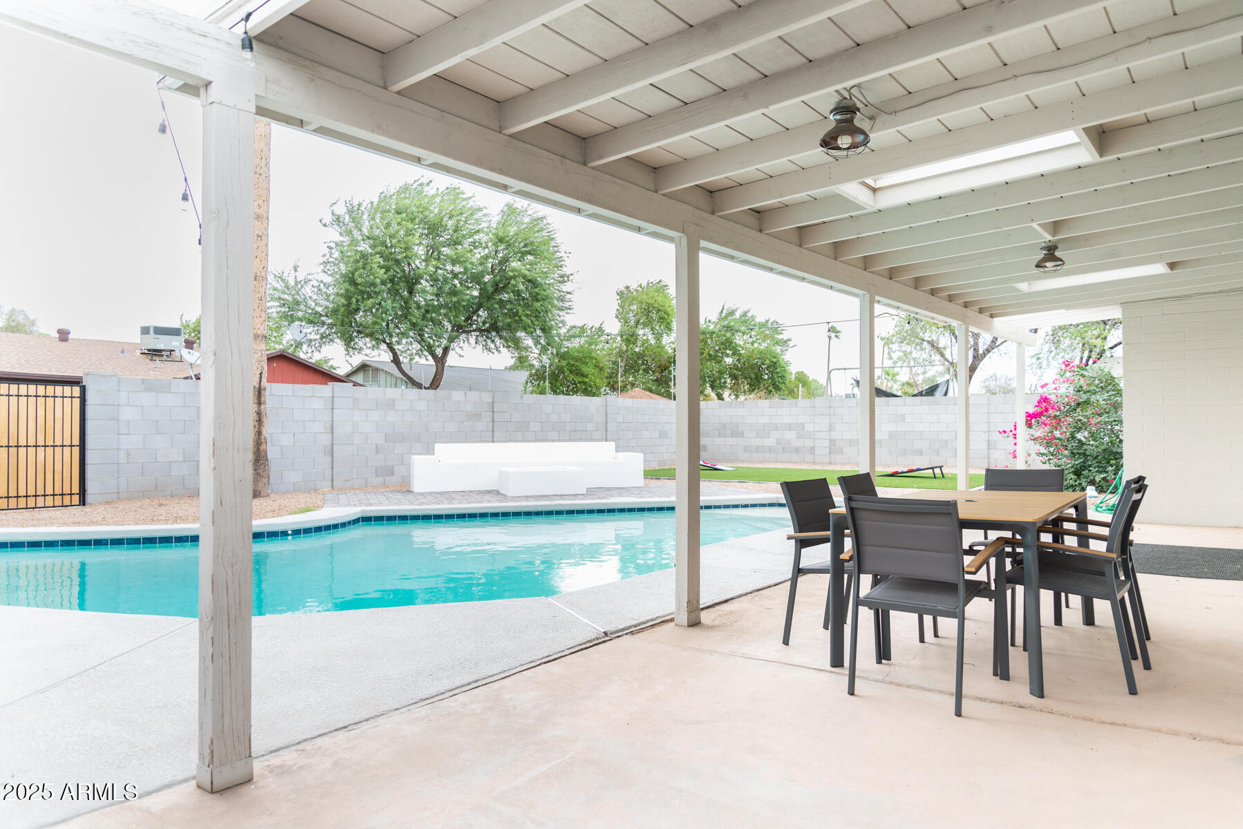 2140 East Broadmor Drive Tempe, AZ 85282 - Photo 2 of 26 a view of a patio with a table and chairs