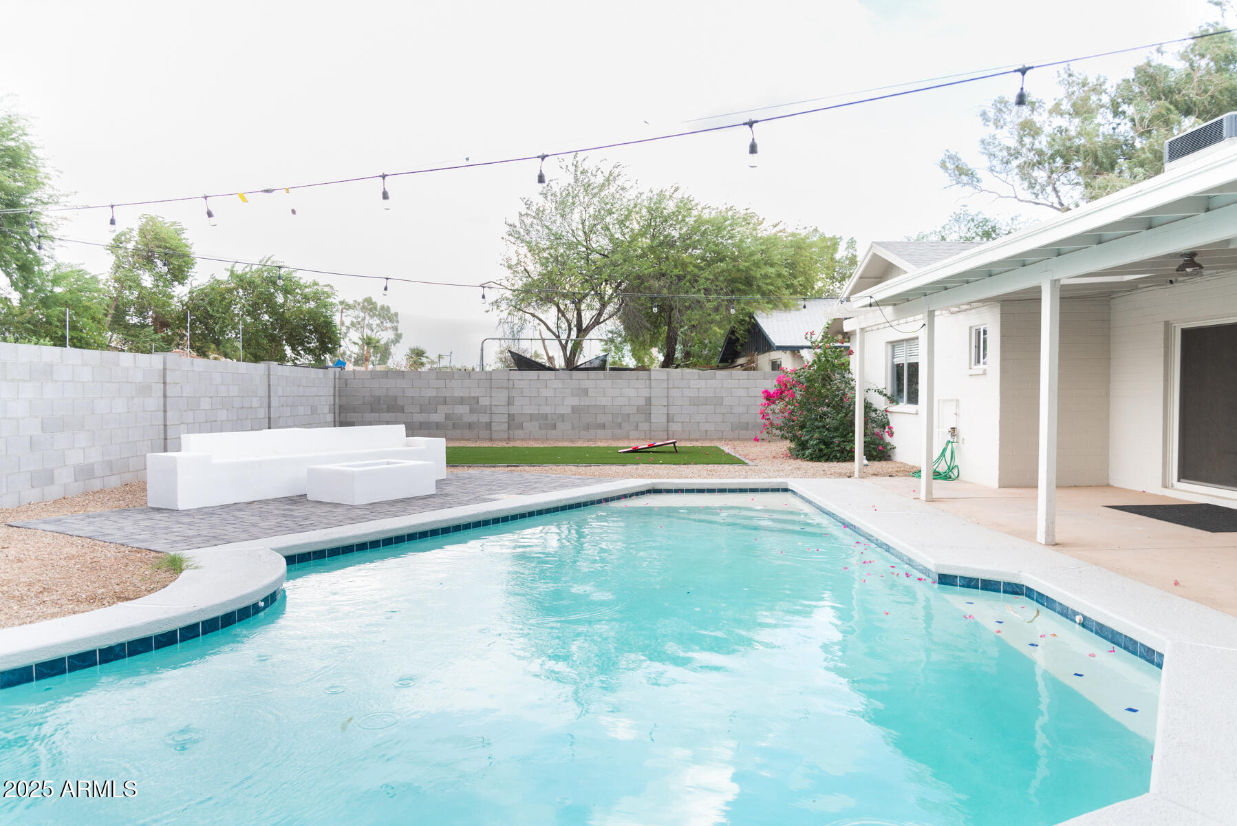 2140 East Broadmor Drive Tempe, AZ 85282 - Photo 3 of 26 a view of a swimming pool with a patio