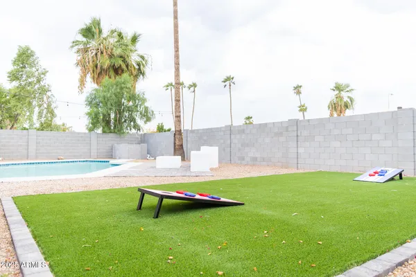 a garden view with a sitting space