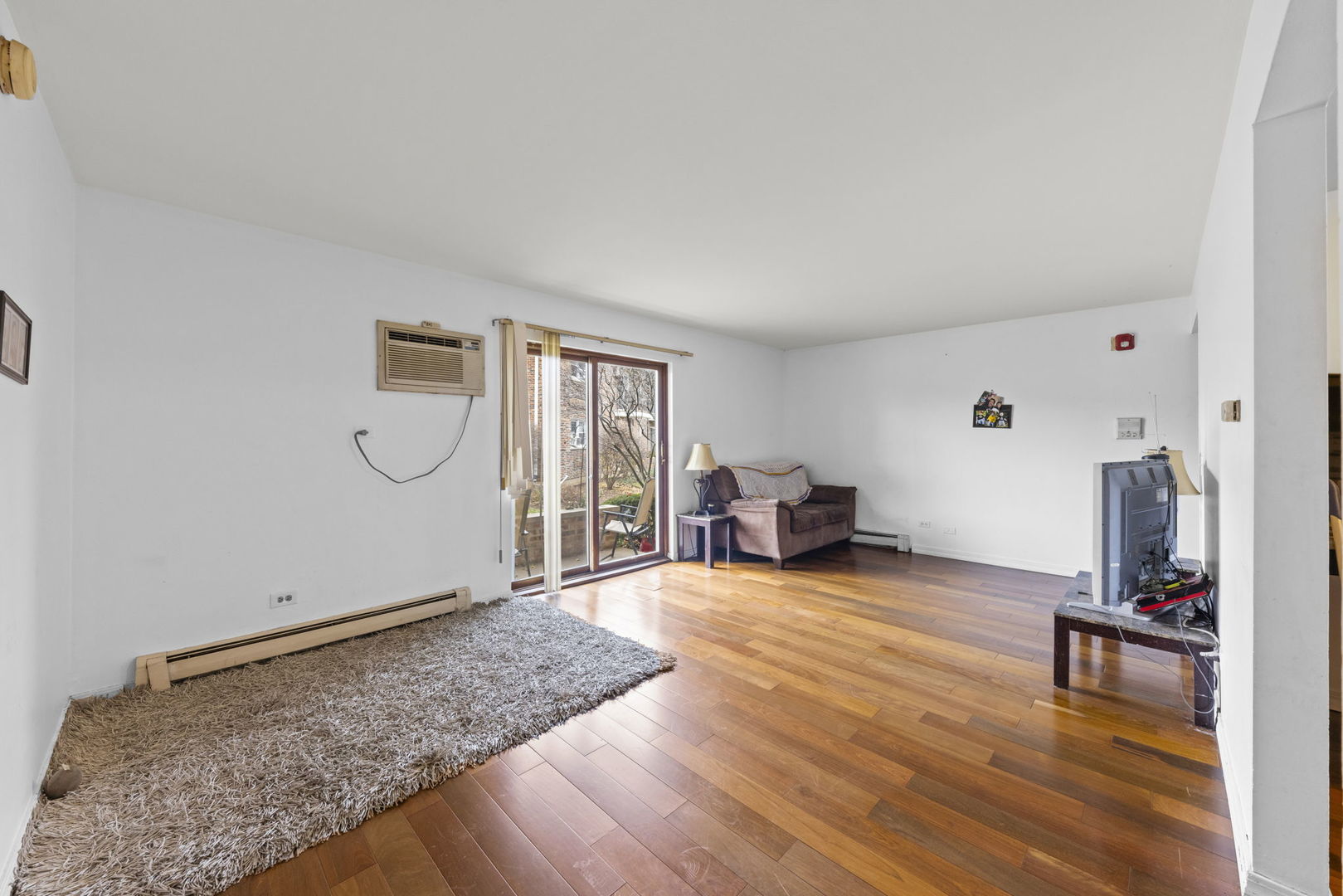 2343 Ogden Avenue, Unit 3 Downers Grove, IL 60515 - Photo 4 of 16 a view of livingroom with hardwood floor and a sink