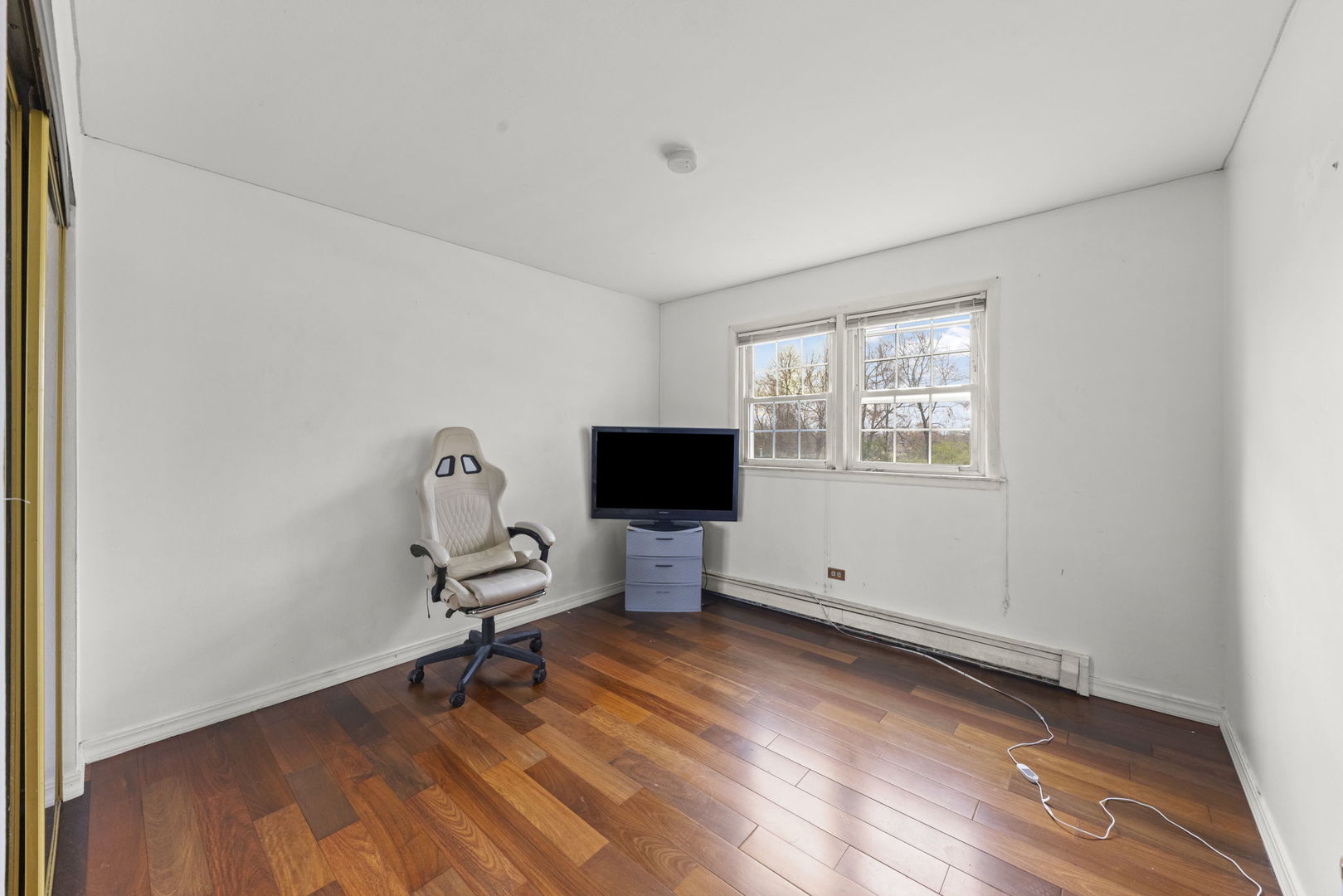 2343 Ogden Avenue, Unit 3 Downers Grove, IL 60515 - Photo 7 of 16 a view of a workspace with furniture and a window