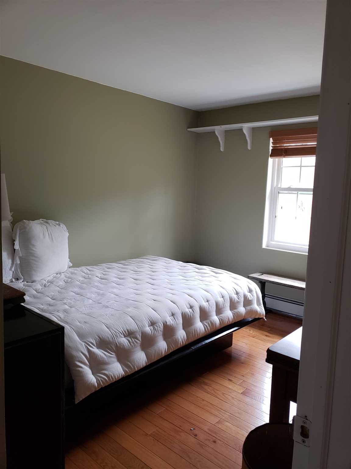 152 Belvedere Road Fishkill, NY 12508 - Photo 12 of 18 a bedroom with a bed wooden floor and window