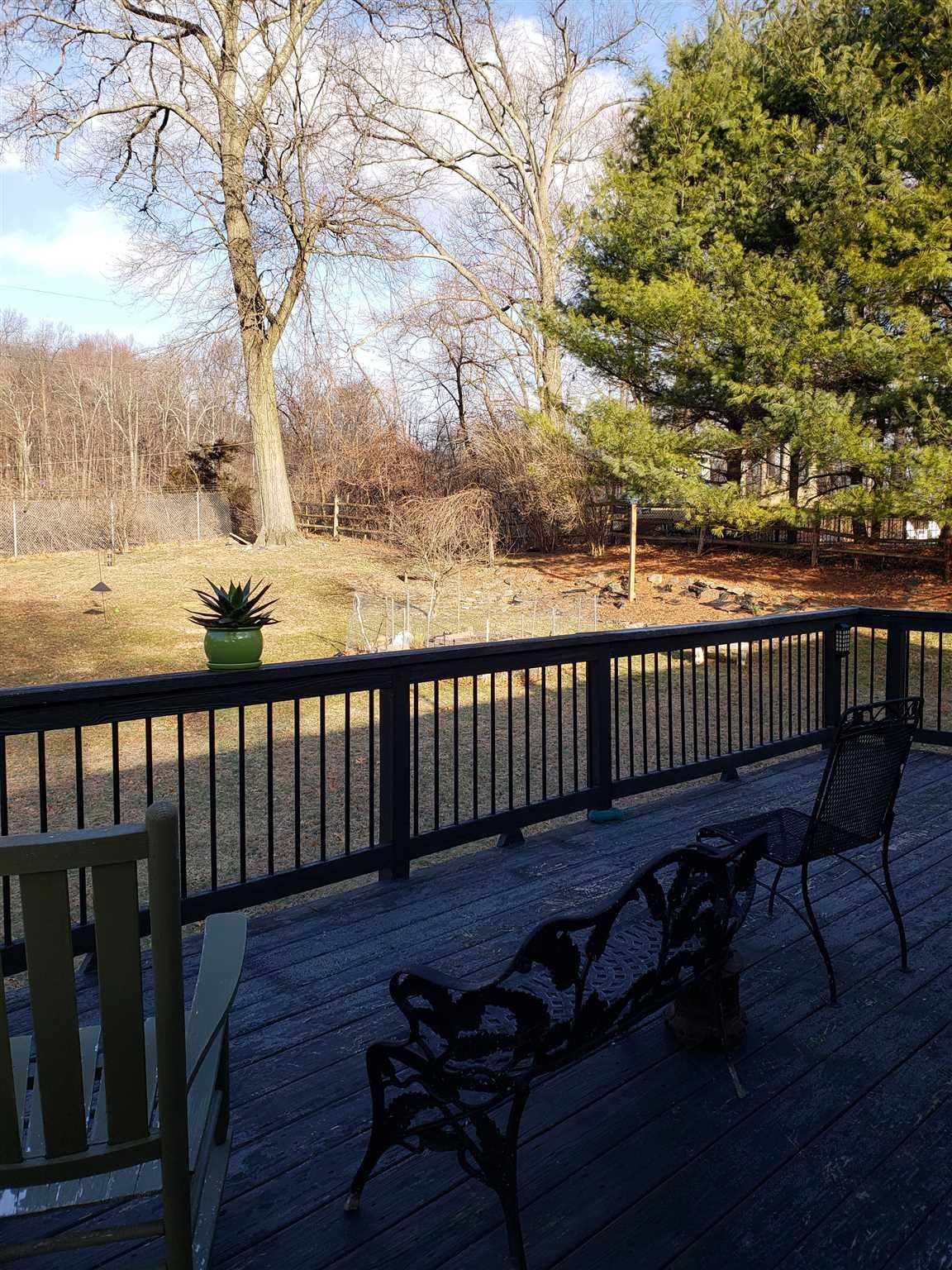 152 Belvedere Road Fishkill, NY 12508 - Photo 17 of 18 a view of a roof deck with wooden fence and floor