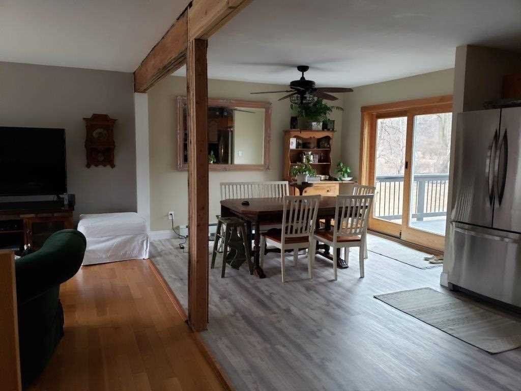 152 Belvedere Road Fishkill, NY 12508 - Photo 6 of 18 a view of a dining room with furniture window and wooden floor