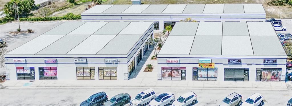 7135 State Road 52 Hudson, FL 34667 - Photo 2 of 14 a view of a building with a lot of stuff