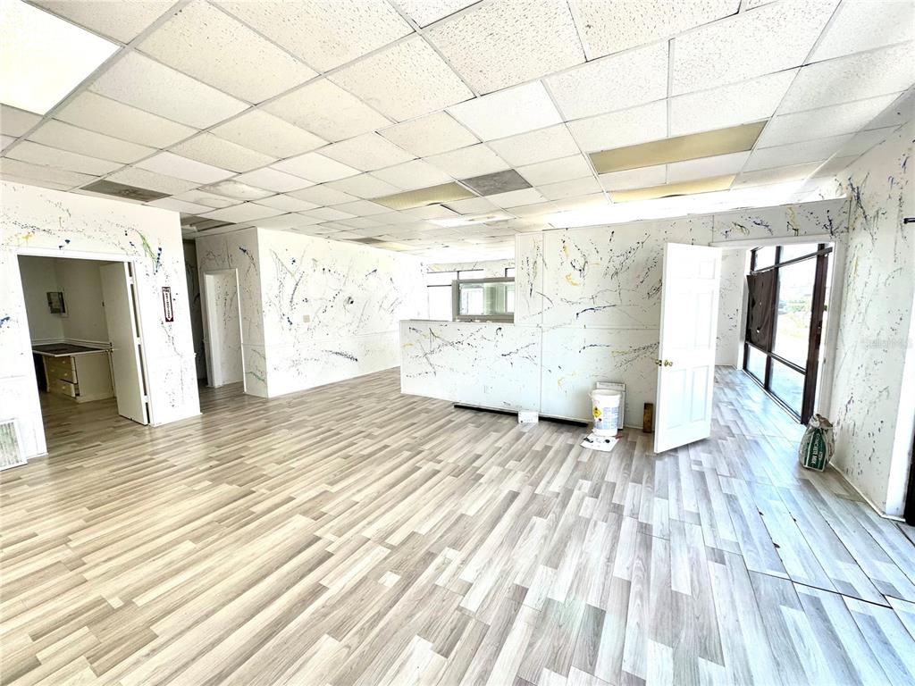 7135 State Road 52 Hudson, FL 34667 - Photo 6 of 14 a view of a living room and wooden floor
