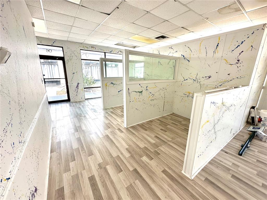 7135 State Road 52 Hudson, FL 34667 - Photo 7 of 14 a view of a hardwood floor and staircase in a room