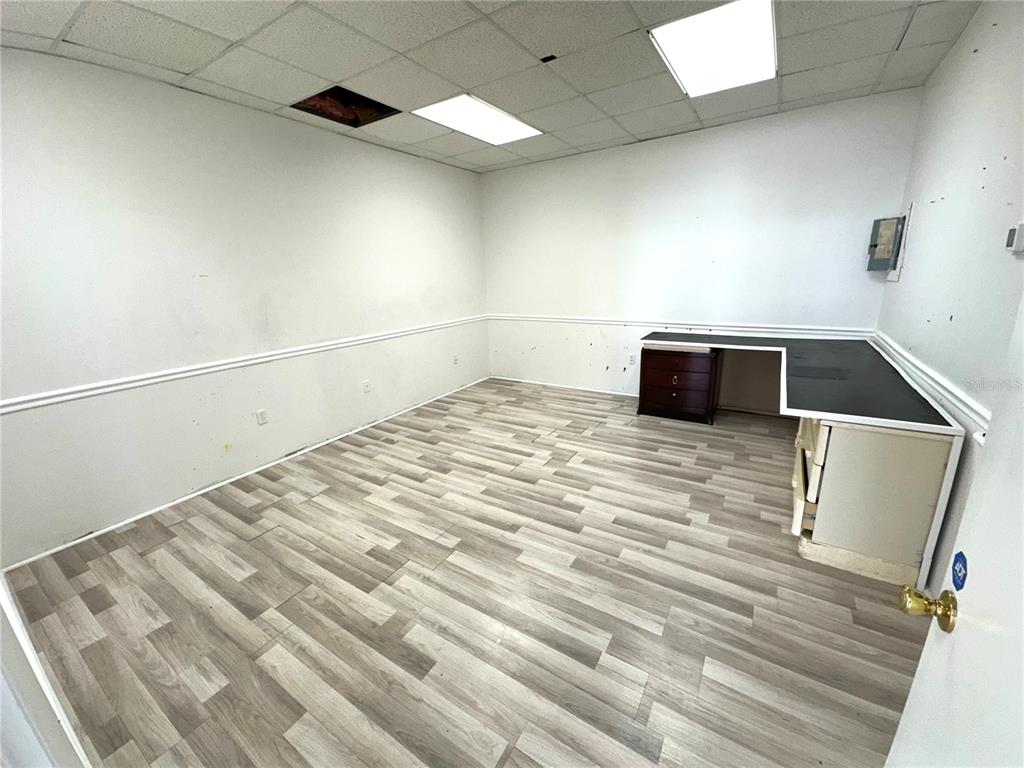 7135 State Road 52 Hudson, FL 34667 - Photo 8 of 14 a view of a room with wooden floor