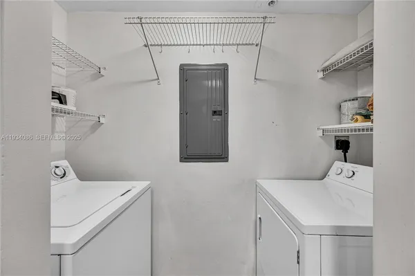 a utility room with dryer and washer