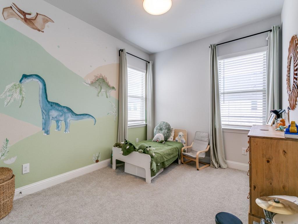 12964 Rockham Lane Dallas, TX 75234 - Photo 18 of 24 a living room with furniture and a window