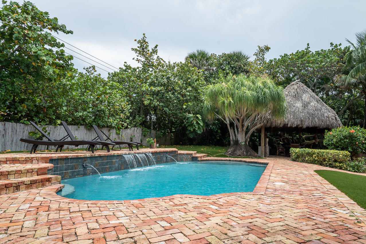 6060 North Ocean Boulevard Ocean Ridge, FL 33435 - Photo 4 of 23 Pool view/tiki
