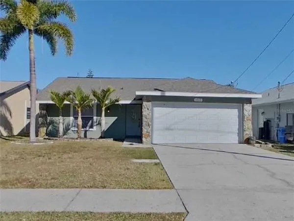 a view of a house with a patio