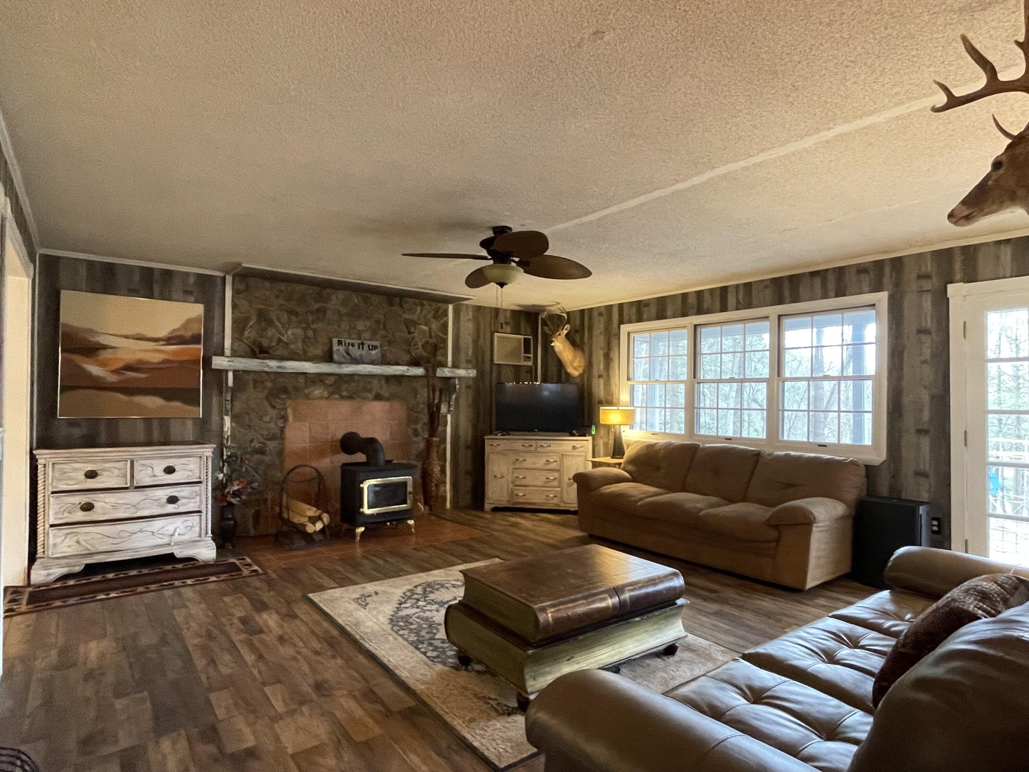 1522 Turkey Creek Road Tellico Plains, TN 37385 - Photo 28 of 34 a bedroom with furniture and a window