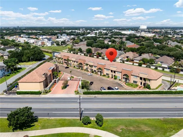 a view of swimming pool from a balcony