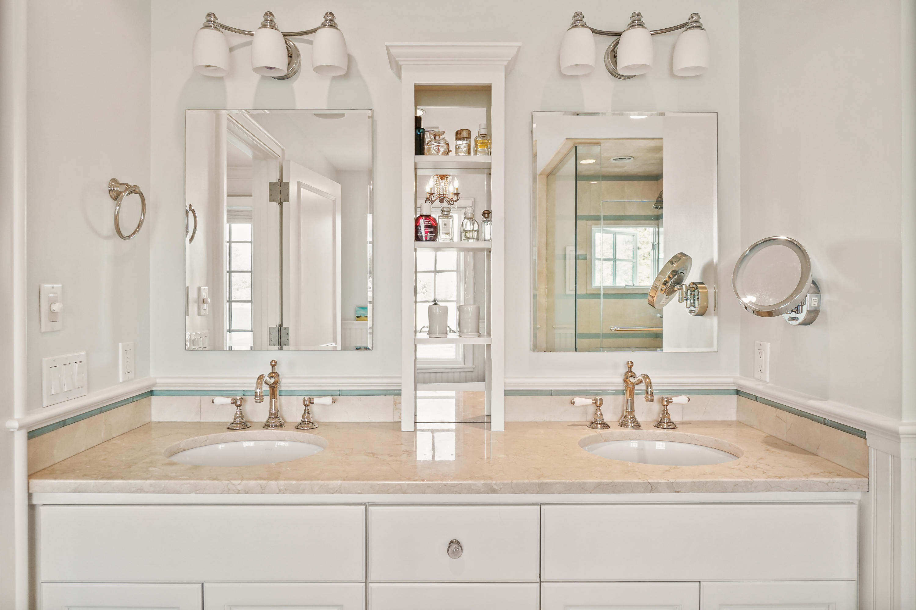 22 Pine Point Road Rowayton, CT 06853 - Photo 18 of 26 a bathroom with double vanity sinks and a mirror