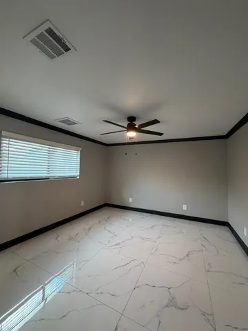 an empty room with windows