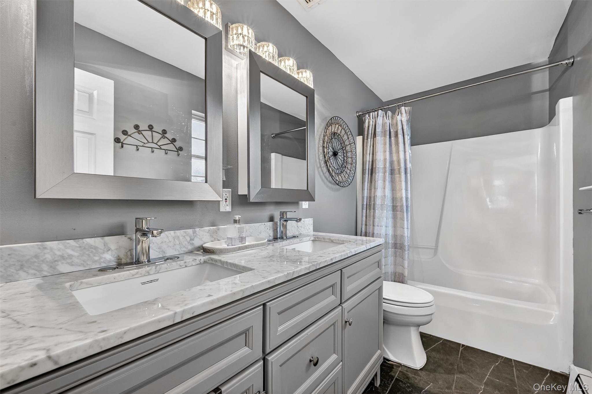 508 Walker Valley Road Pine Bush, NY 12566 - Photo 14 of 26 a bathroom with a granite countertop sink a toilet and a mirror