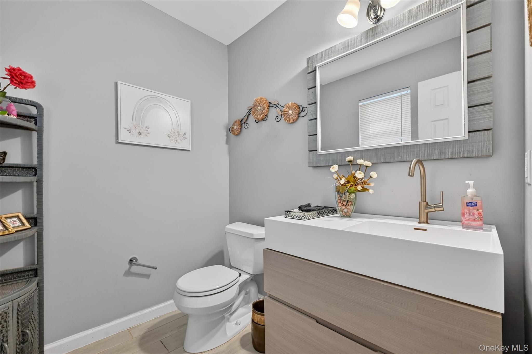 508 Walker Valley Road Pine Bush, NY 12566 - Photo 22 of 26 a bathroom with a sink toilet and mirror