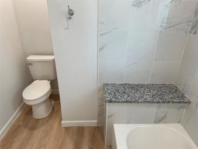 a bathroom with a sink and a bathtub