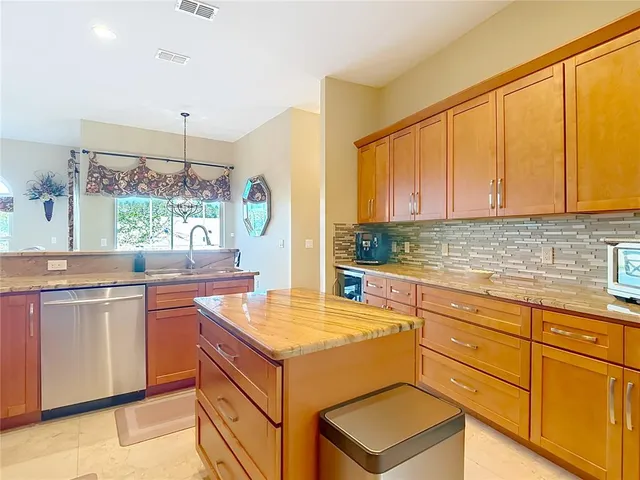 $734,900 | 14140 Stonegate Drive, Tampa, FL 33624