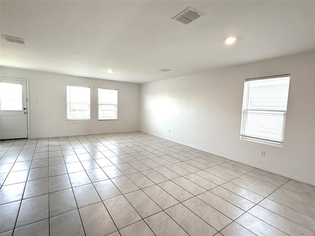 128 Honeysuckle Street Princeton, TX 75407 - Photo 4 of 19 tilie flooring throughout