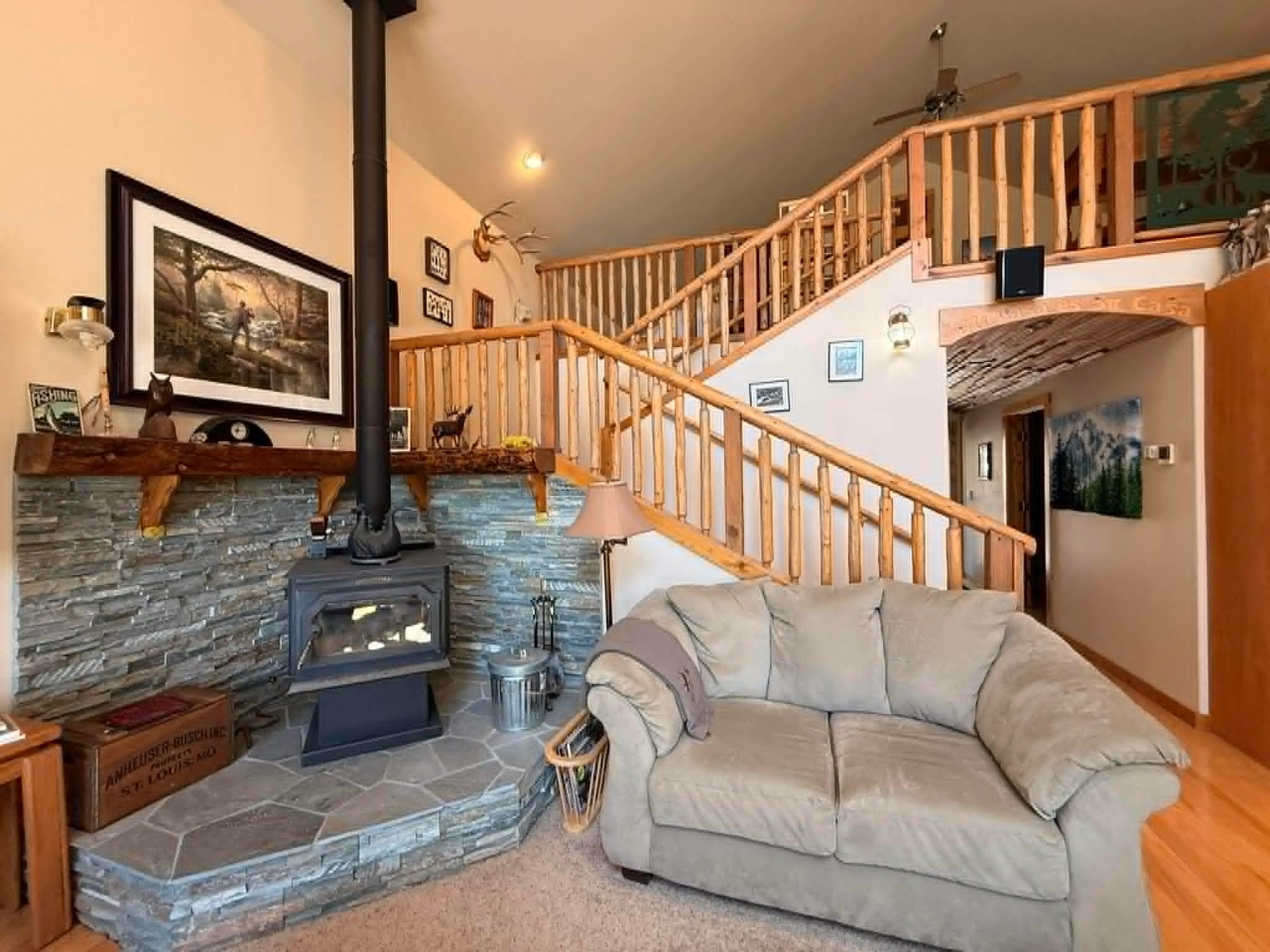 93 Juniper Road Beckwourth, CA 96129 - Photo 5 of 35 a living room with furniture and a flat screen tv