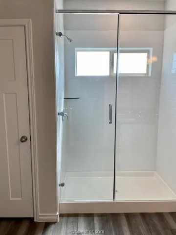 a bathroom with a bath tub