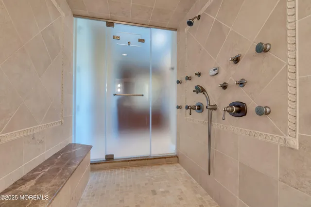 a view of a lake with a house in the background