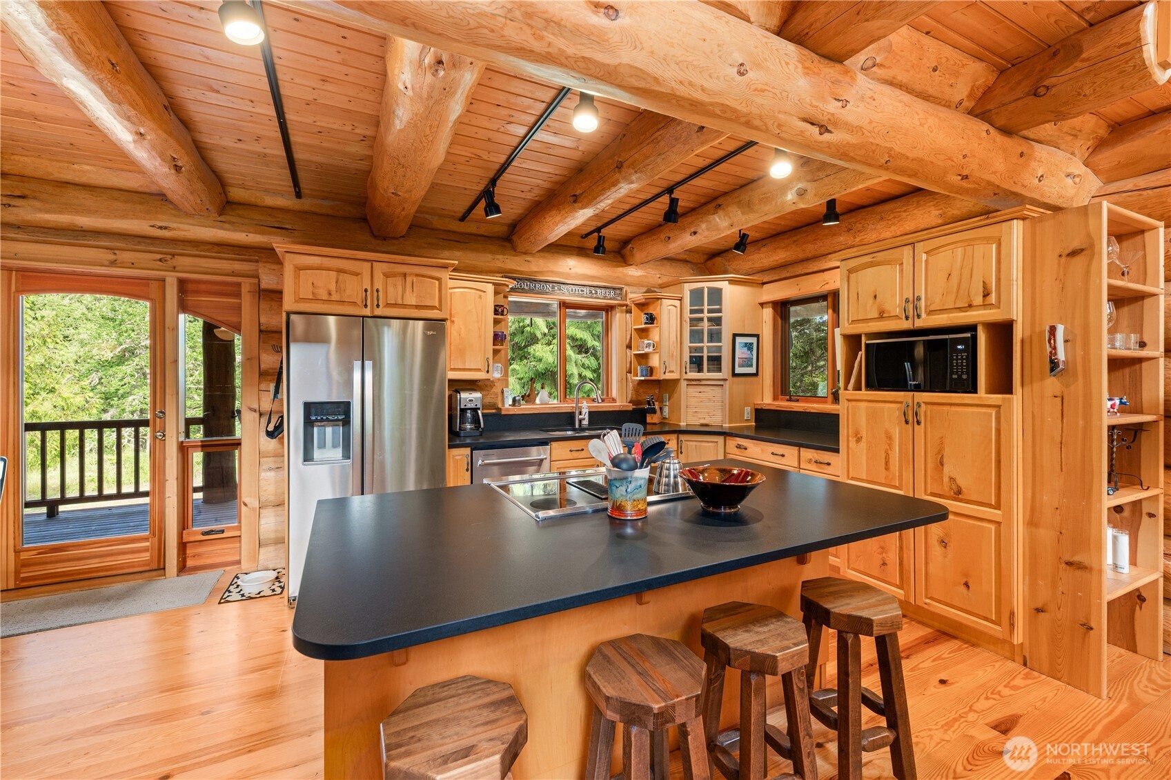 134 Sacred Moon Way Friday Harbor, WA 98250 - Photo 8 of 35 a view of a dining room with furniture and wooden floor