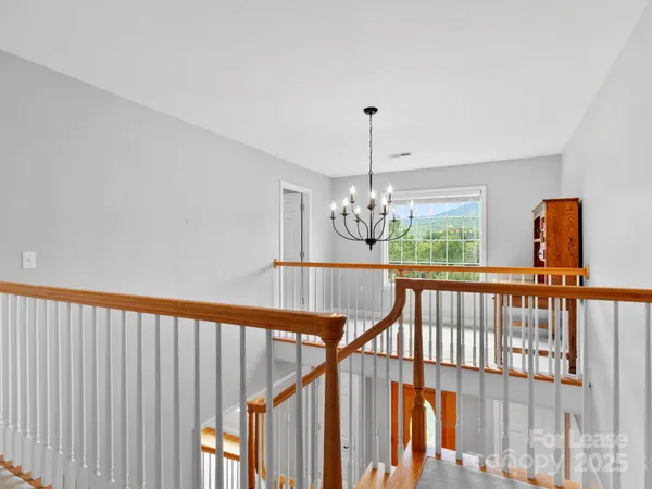 a view of an entryway wooden floor