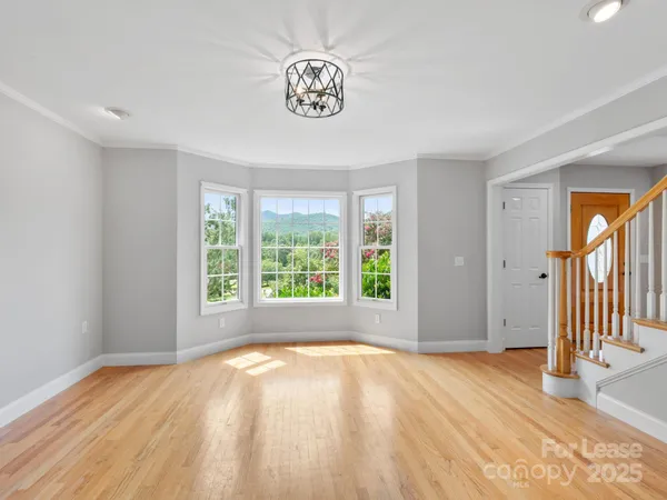 a view of empty room with a window