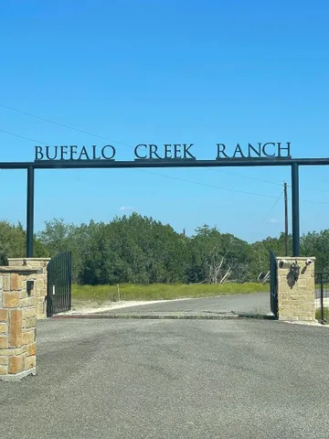 a view of a terrace with a lake view