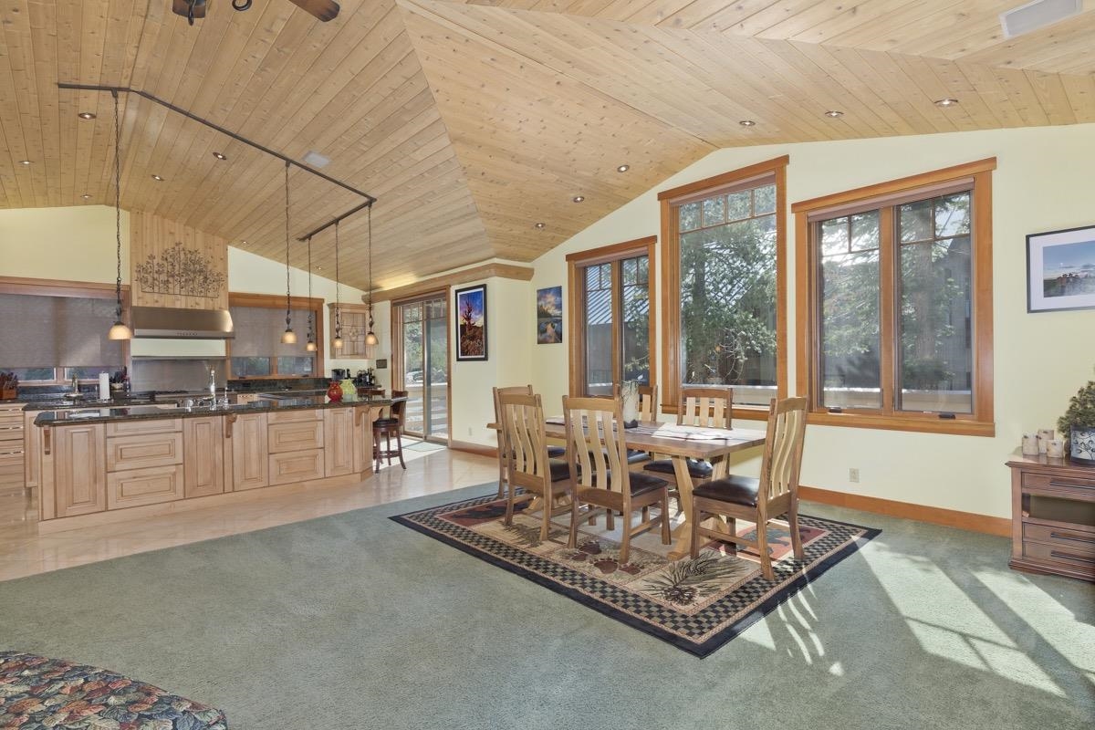 2500 Old Mammoth Road Mammoth Lakes, CA 93546 - Photo 13 of 48 a living room with kitchen furniture and large window