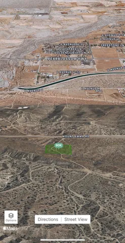 a view of water heater and a yard