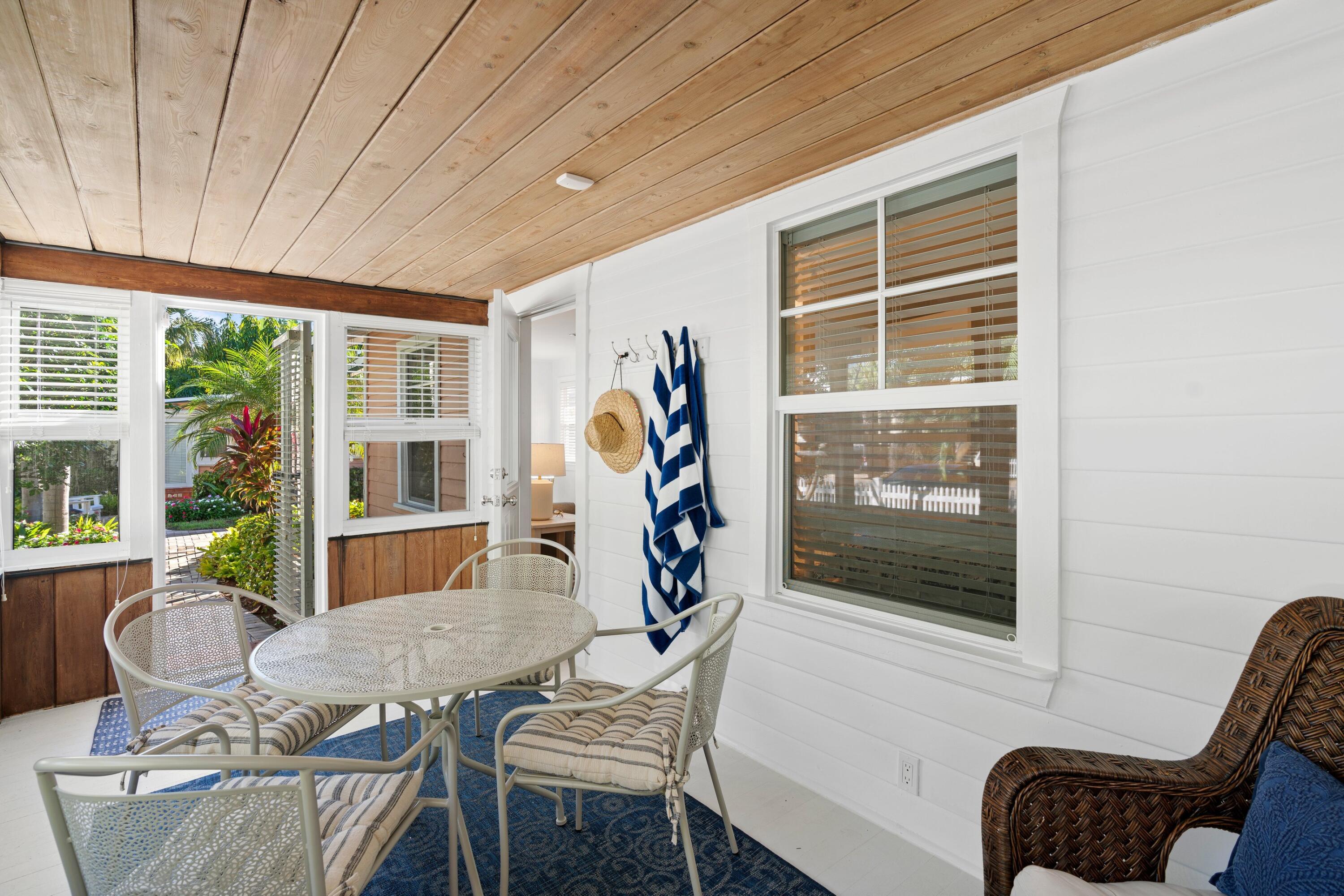 118 Southeast 7th Avenue Delray Beach, FL 33483 - Photo 2 of 17 a view of a livingroom with furniture and entryway