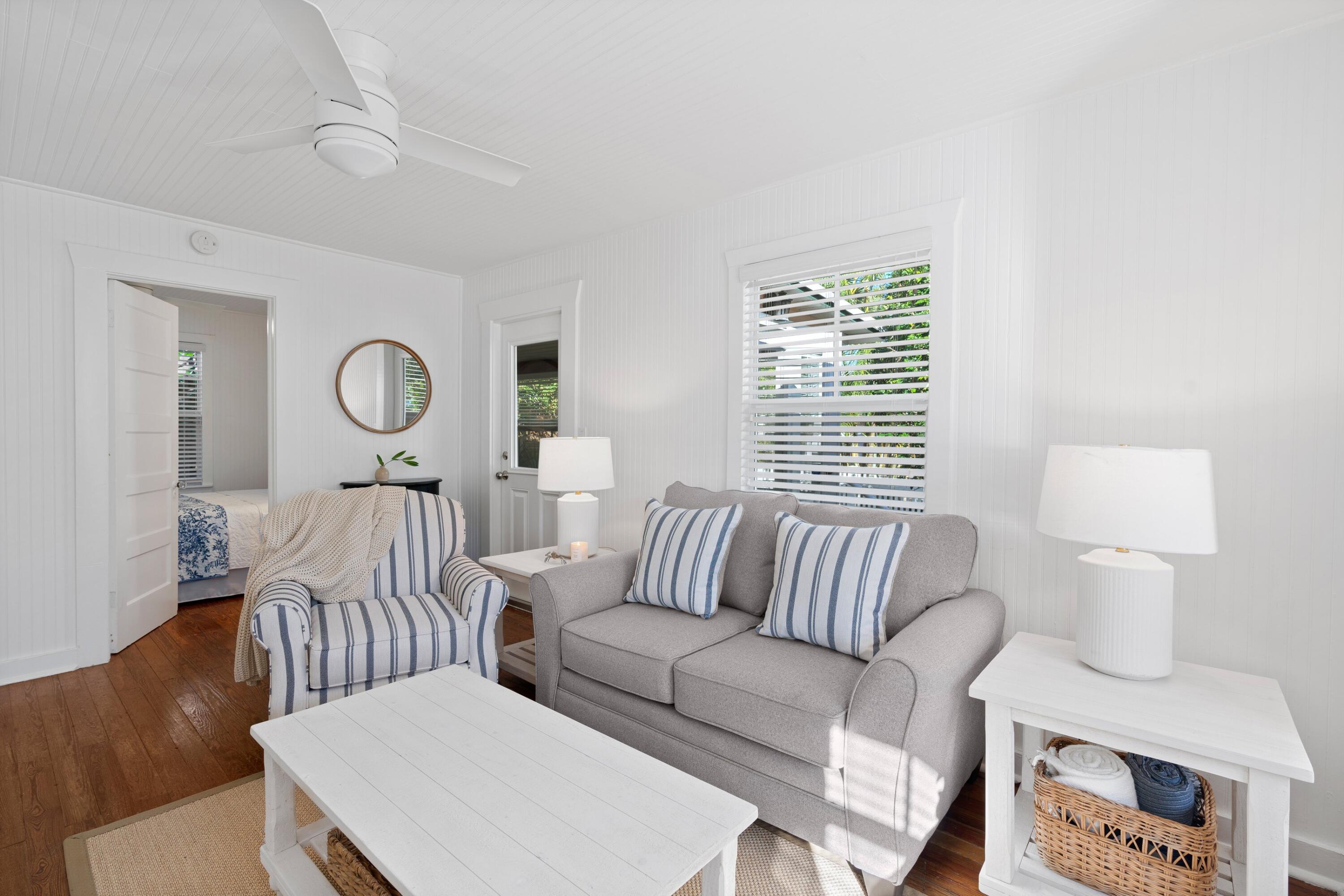 118 Southeast 7th Avenue Delray Beach, FL 33483 - Photo 5 of 17 a living room with furniture and wooden floor