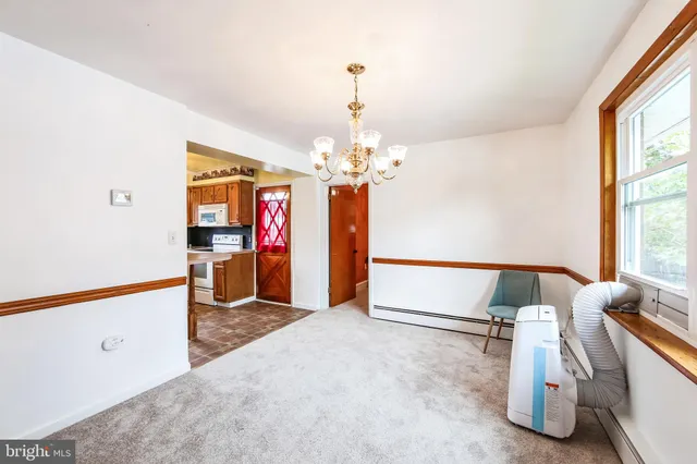 a view of livingroom with furniture and window