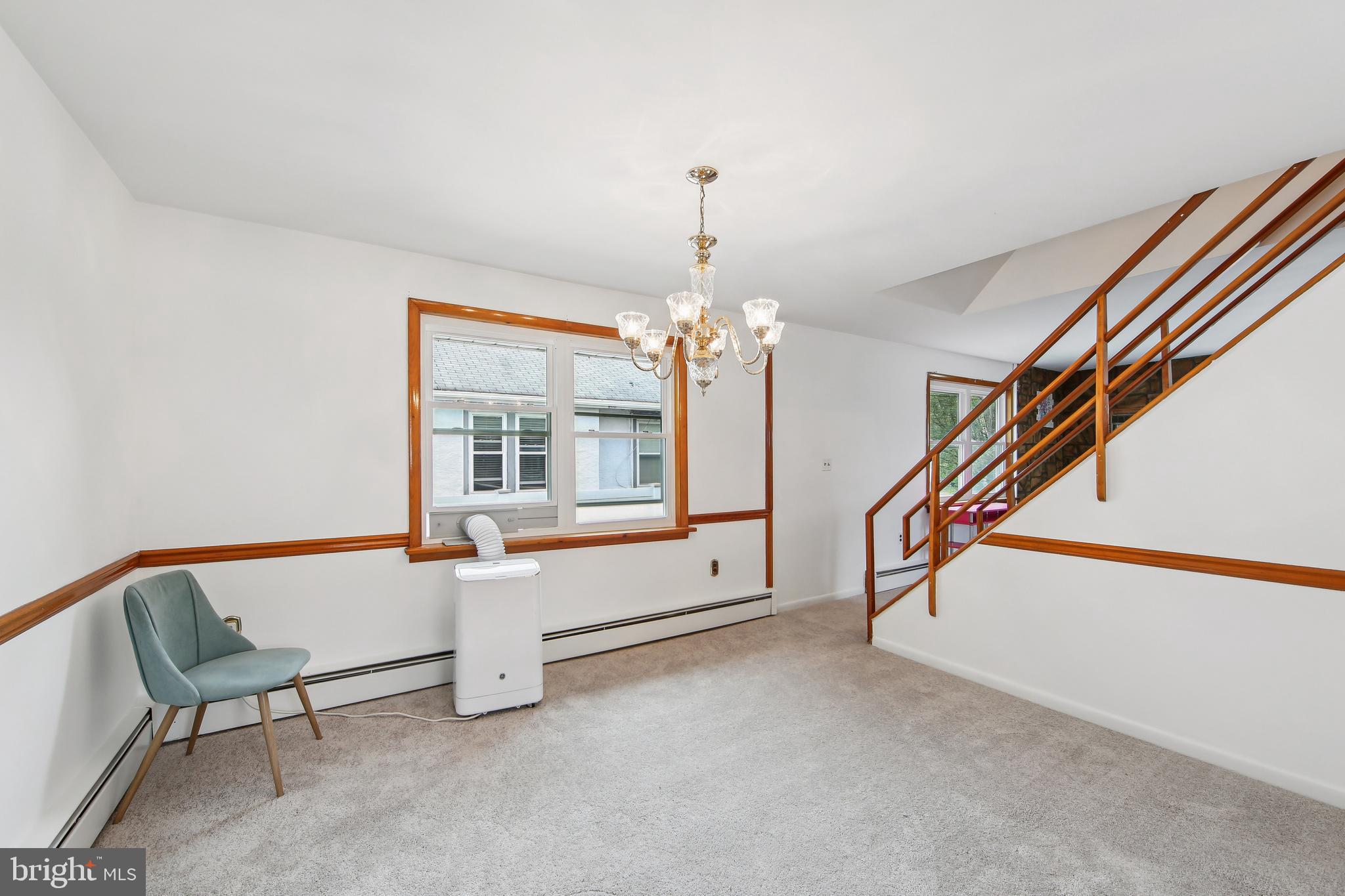 200 East Roland Road Brookhaven, PA 19015 - Photo 16 of 47 a spacious bedroom with a bed and a window