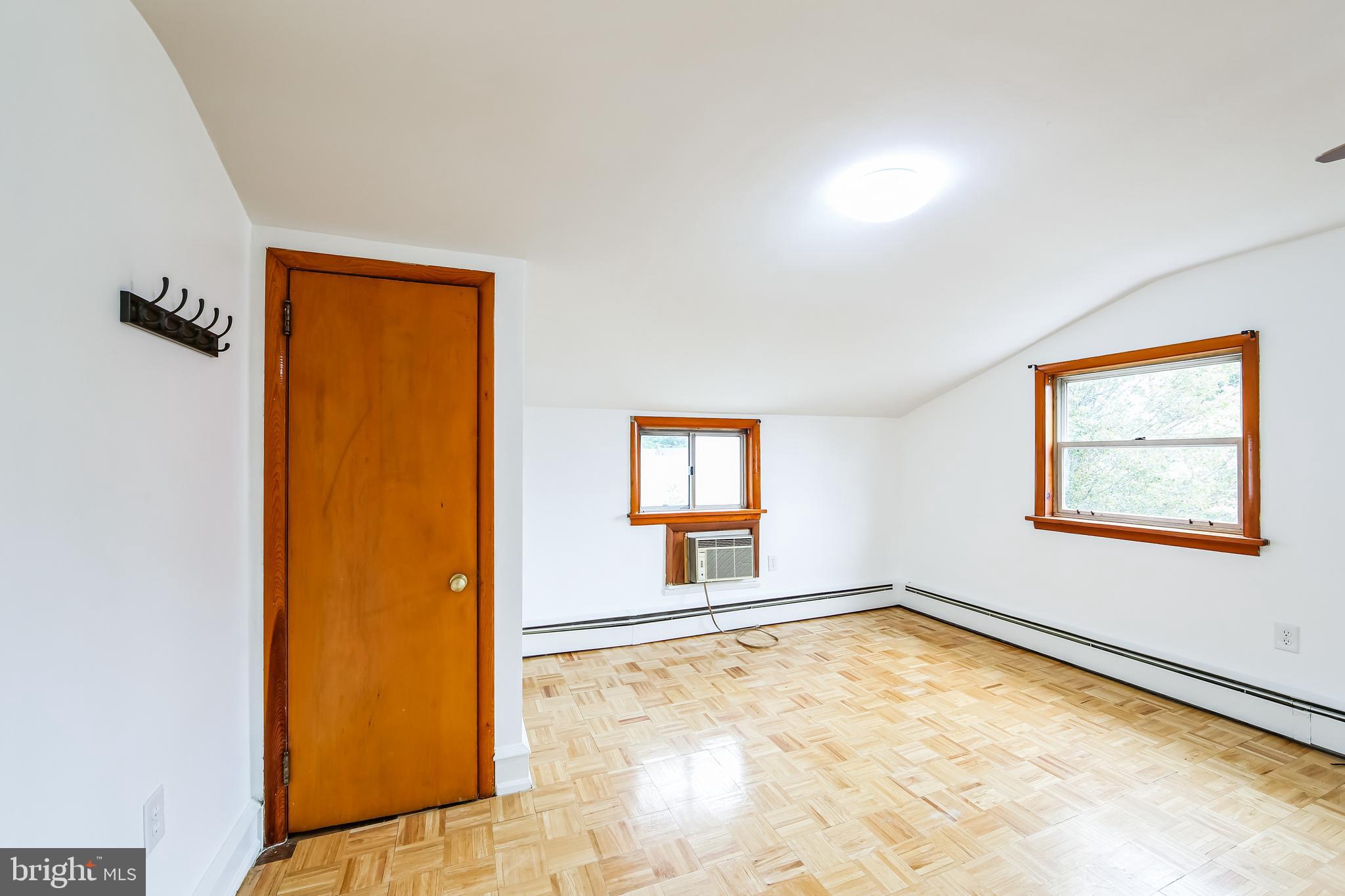 200 East Roland Road Brookhaven, PA 19015 - Photo 23 of 47 an empty room with windows