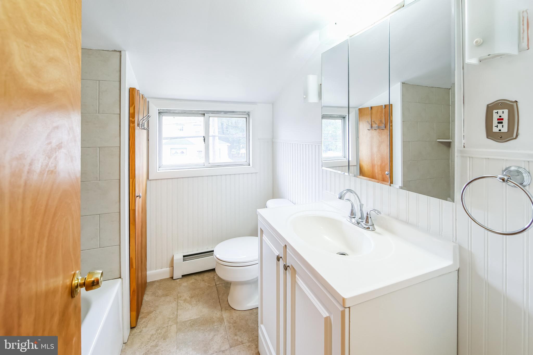 200 East Roland Road Brookhaven, PA 19015 - Photo 29 of 47 a bathroom with a sink toilet and shower