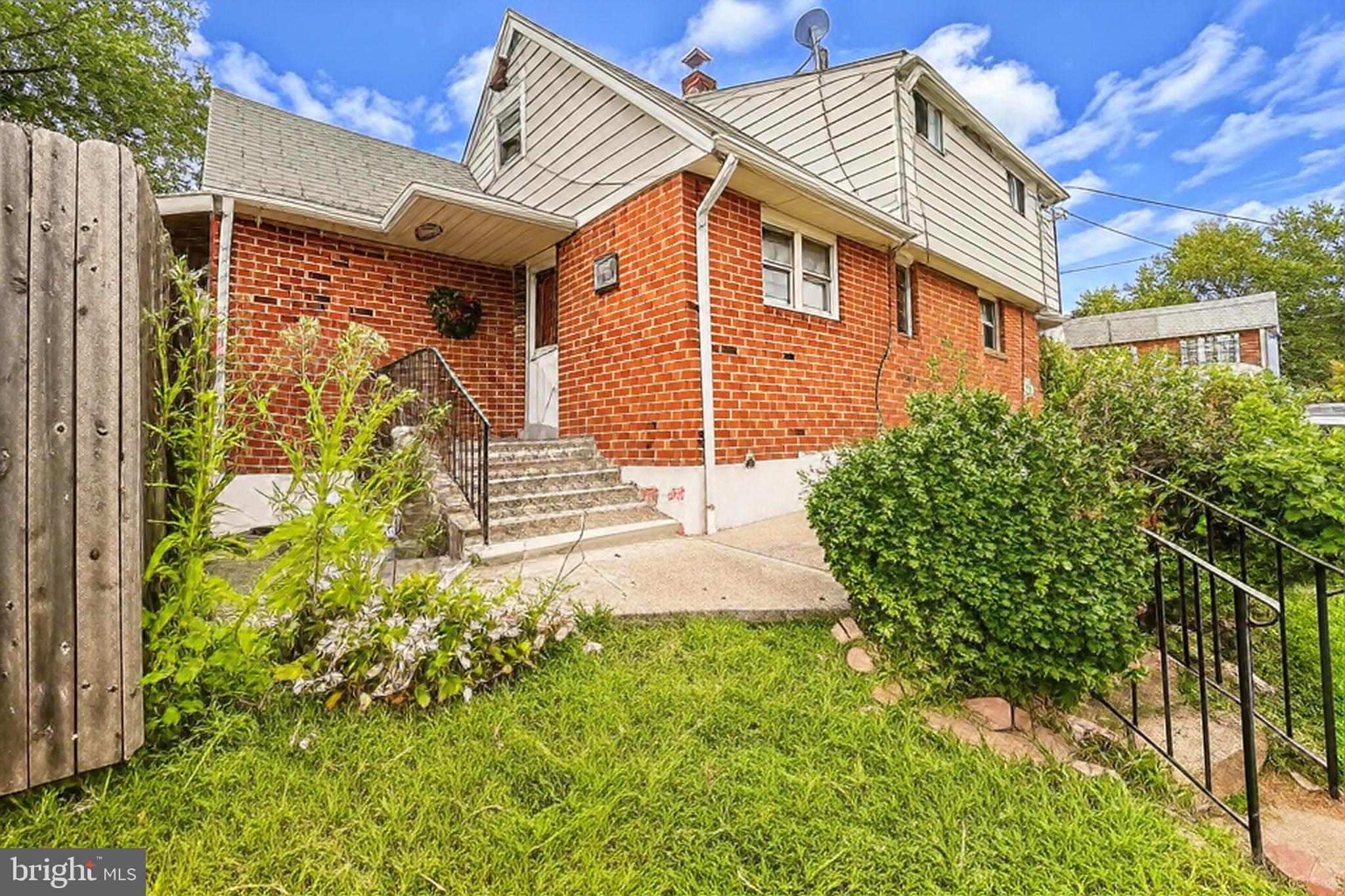 200 East Roland Road Brookhaven, PA 19015 - Photo 39 of 47 a front view of a house with garden