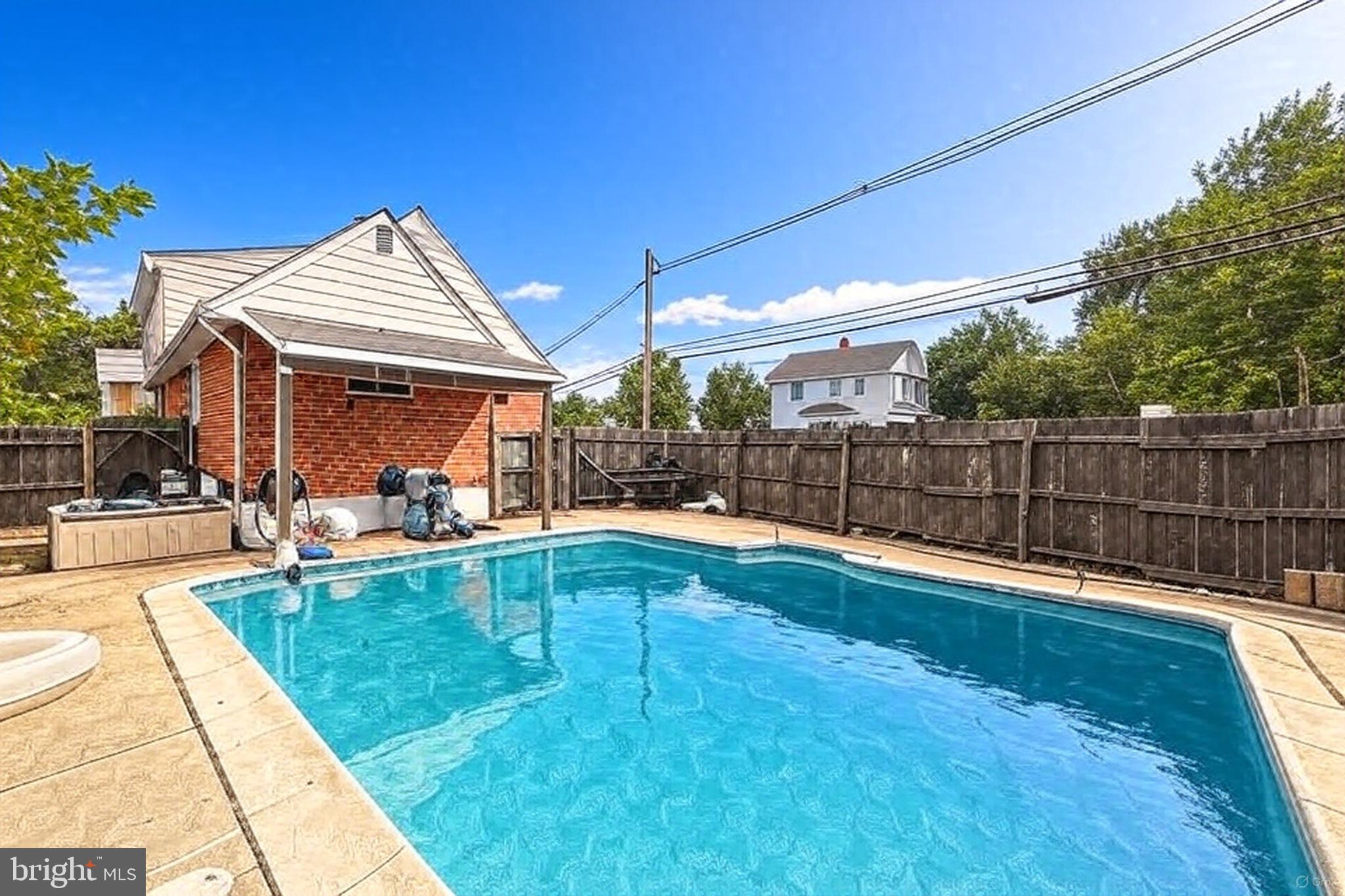 200 East Roland Road Brookhaven, PA 19015 - Photo 41 of 47 a view of a backyard with swimming pool