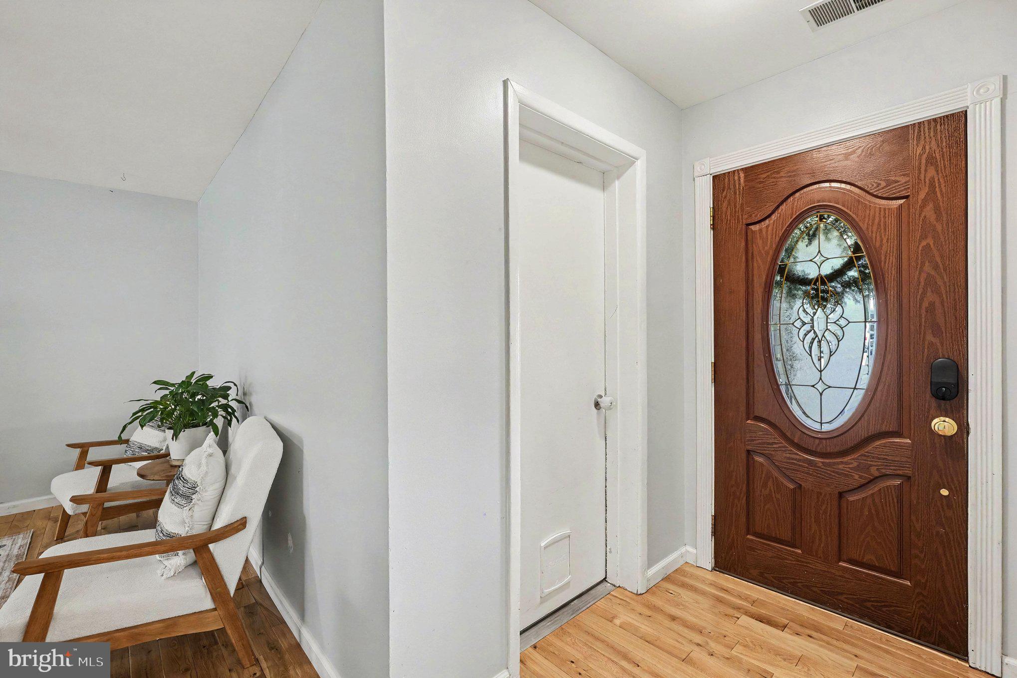 8853 Olde Mill Run Road Manassas, VA 20110 - Photo 19 of 29 Welcoming entryway with elegant door.