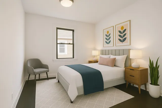 a bedroom with a bed and a couch