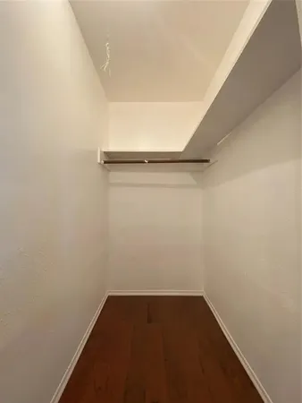 a view of small space with racks on the wall