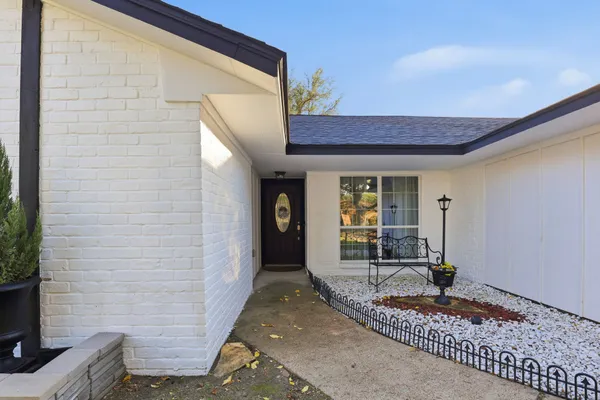 a front view of a house with a porch