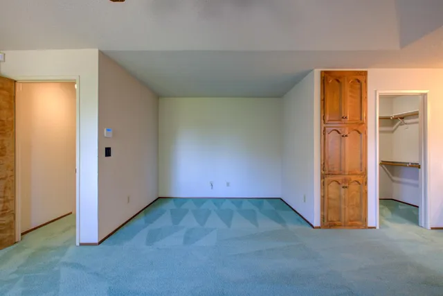 an empty room with closet